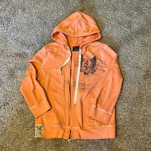 A coral nautical zip up sweatshirt